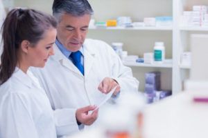 photo of pharmacists comparing viagra vs sildenafil