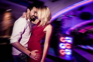 couple dancing in night club